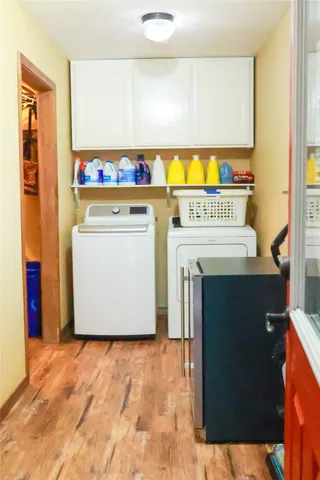 a utility room with washer and dryer