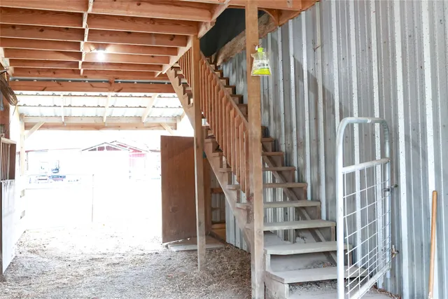 a view of entryway with wooden floor and a window