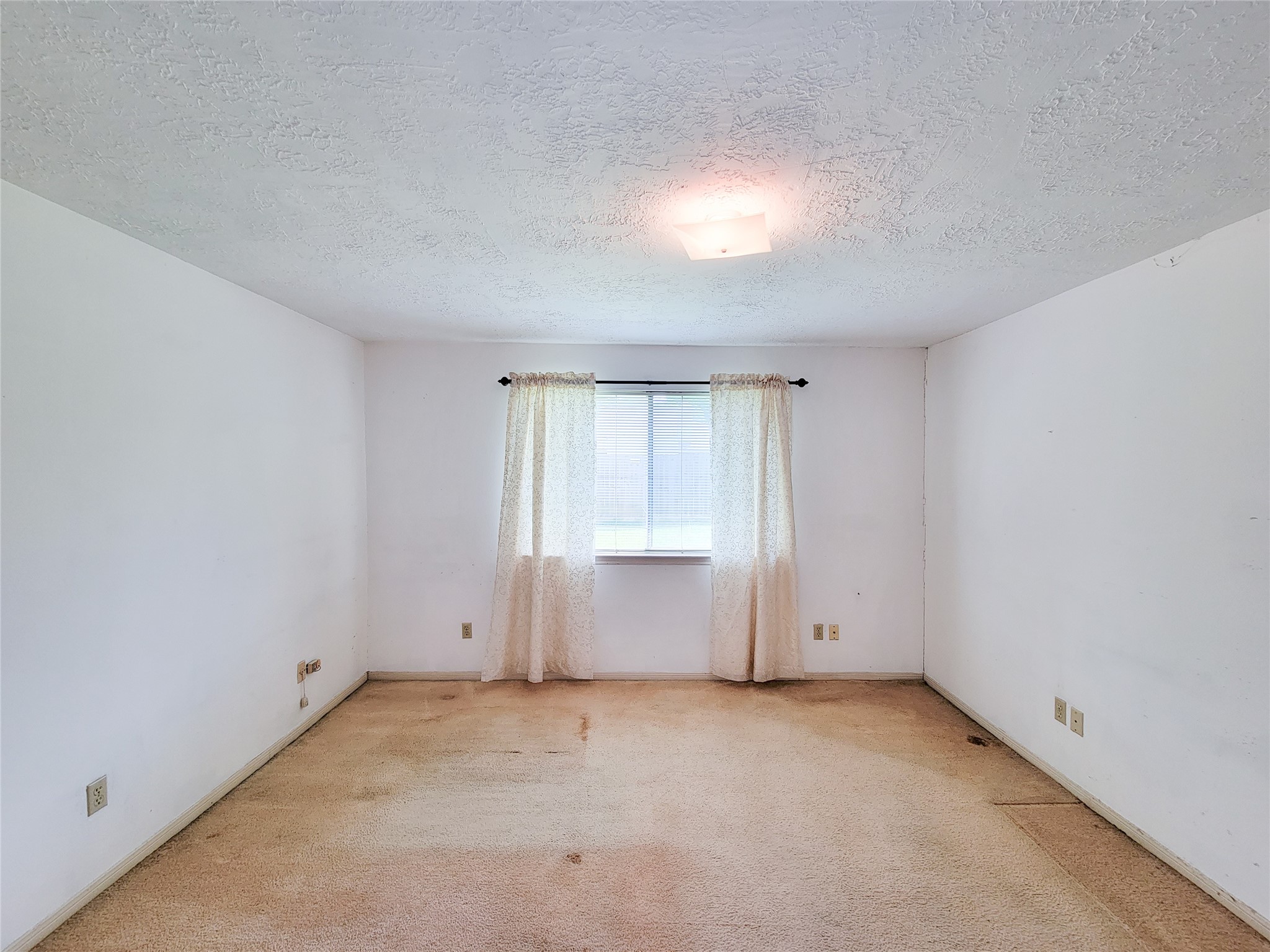 23211 Timberbrook Drive Spring, TX 77373 - Photo 25 of 34 an empty room with a window