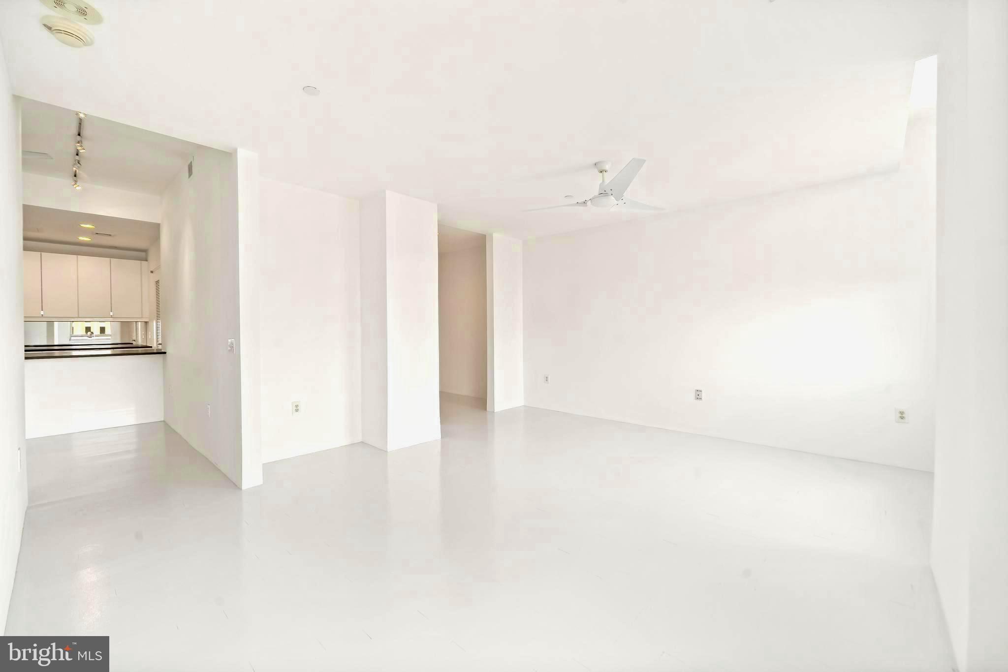 1600 Arch Street, Unit 1809 Philadelphia, PA 19103 - Photo 20 of 36 a view of a kitchen with a sink and a refrigerator