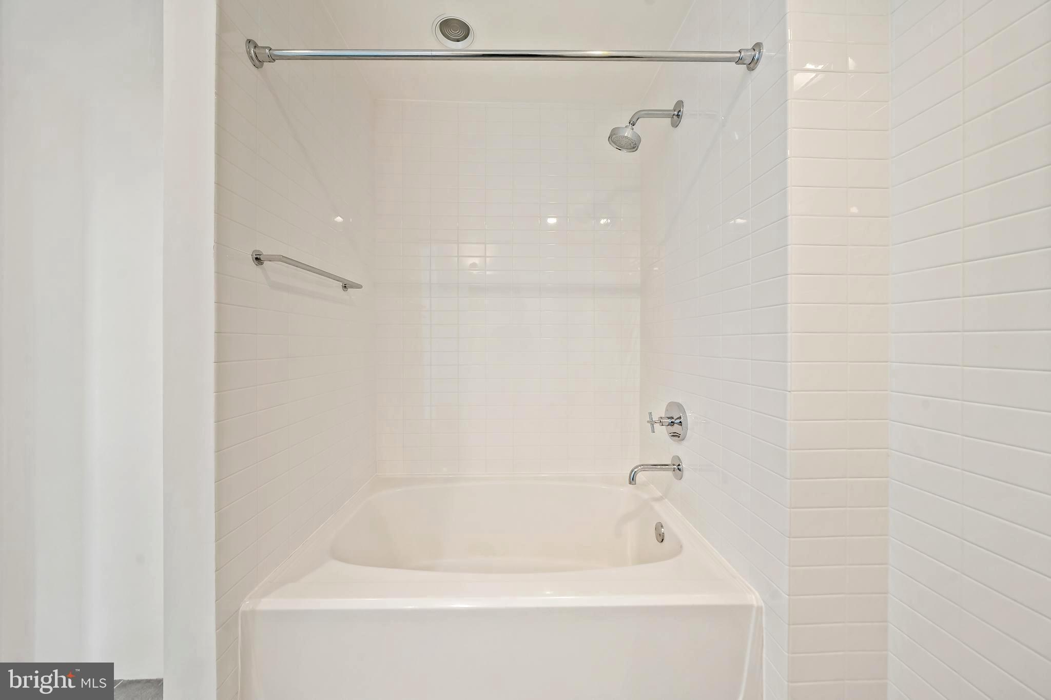 1600 Arch Street, Unit 1809 Philadelphia, PA 19103 - Photo 26 of 36 a close view of a bathtub in a bathroom