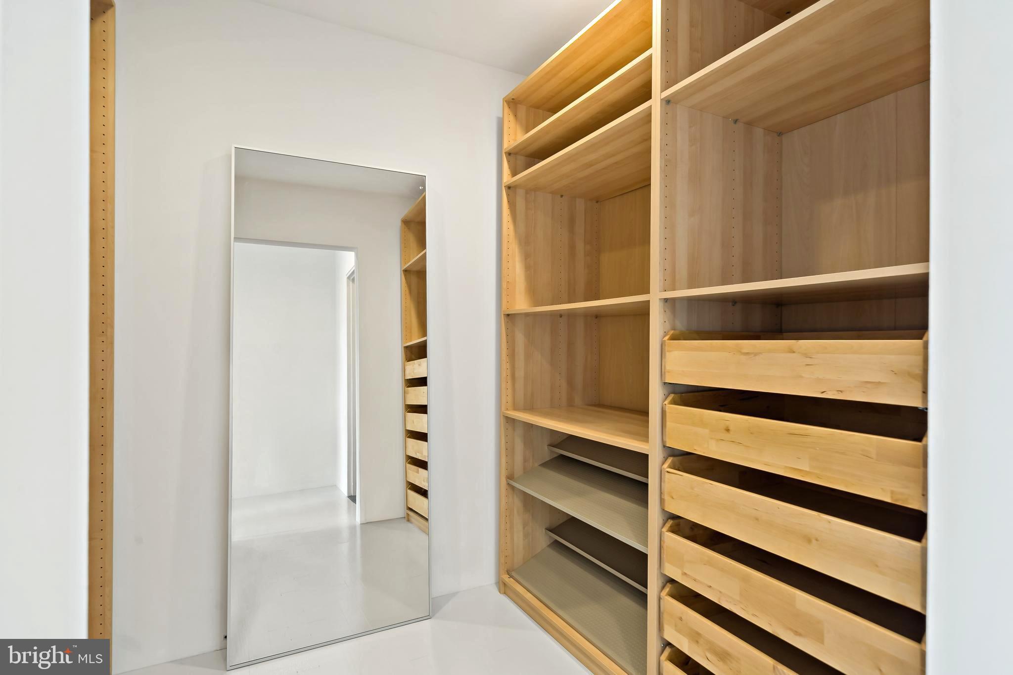 1600 Arch Street, Unit 1809 Philadelphia, PA 19103 - Photo 10 of 36 a view of walk in closet with empty racks