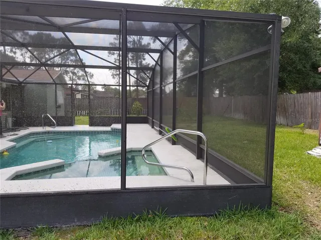a house view with a outdoor seating