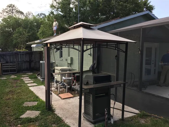a front view of a house with patio