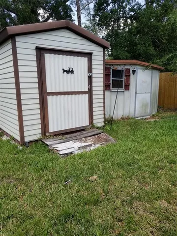 a front view of a house with garage