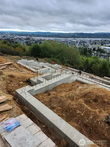 a view of a swimming pool with a yard