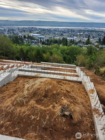 a view of city with ocean