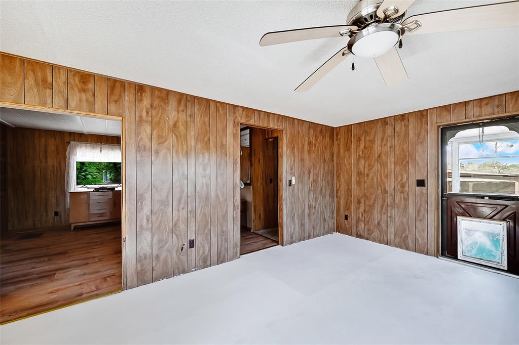 123 Miller Road Pomona Park, FL 32181 - Photo 14 of 36 a view of a room with a ceiling fan