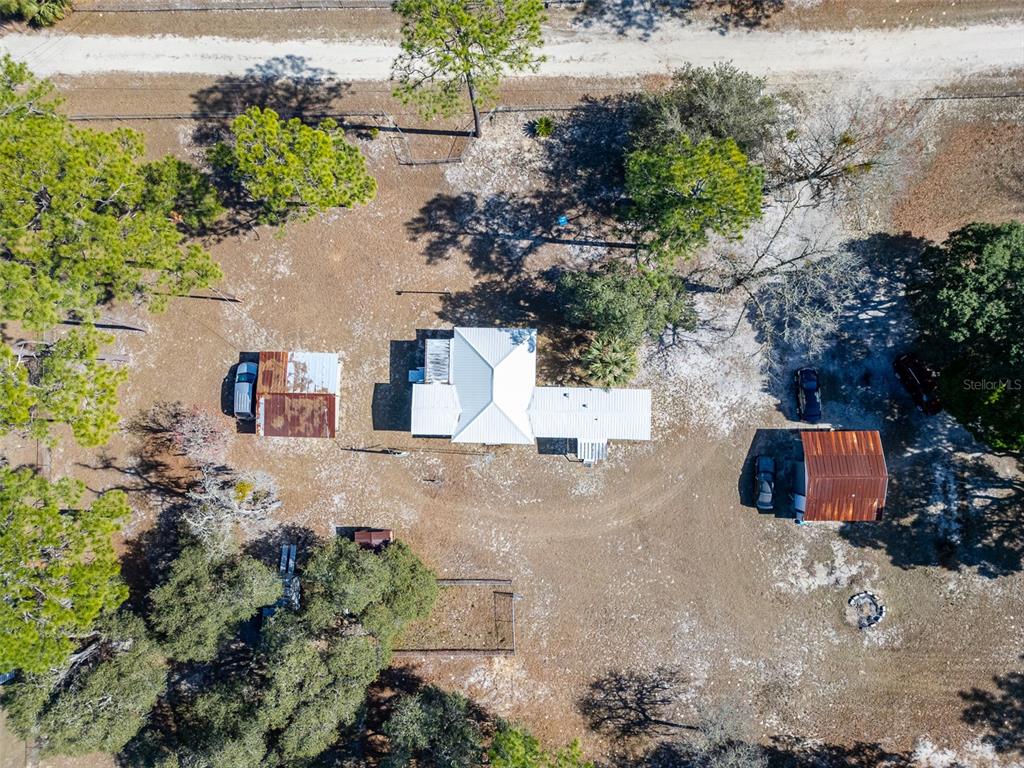 123 Miller Road Pomona Park, FL 32181 - Photo 30 of 36 an aerial view of a house with a yard and lake view