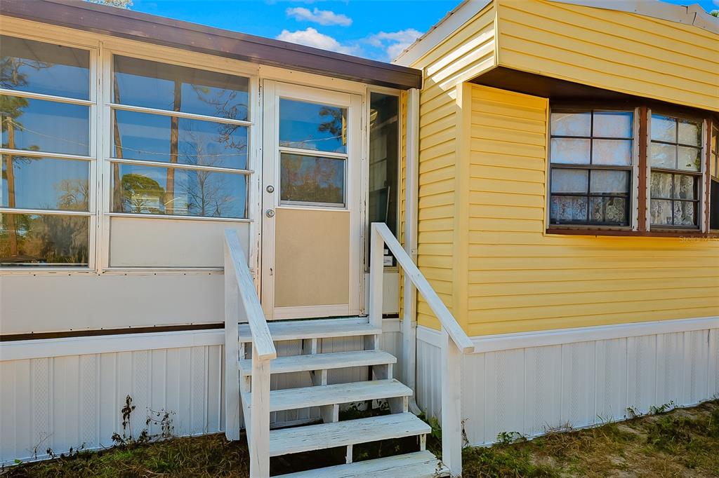 123 Miller Road Pomona Park, FL 32181 - Photo 10 of 36 a view of a house with a window