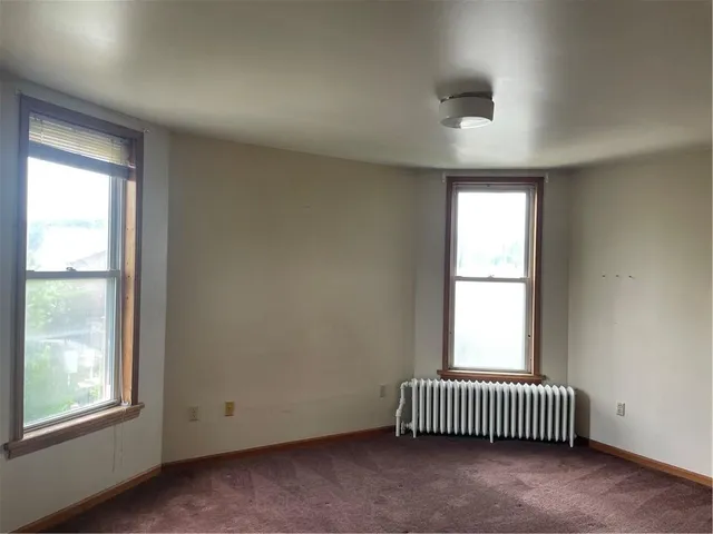 an empty room with windows