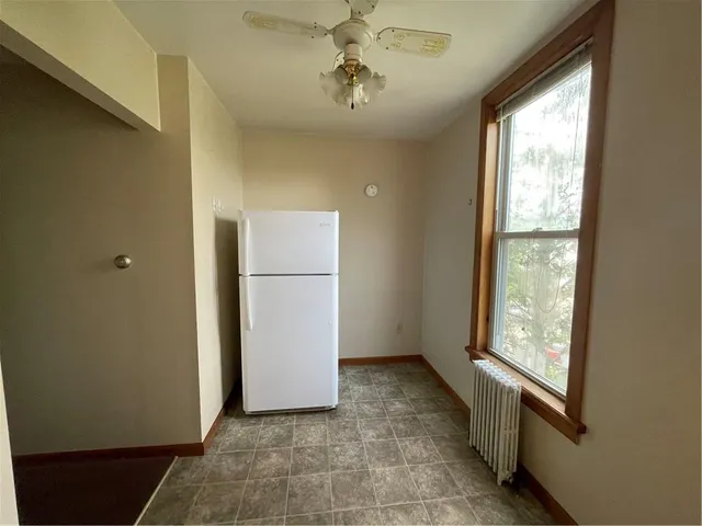 a view of hallway with windows
