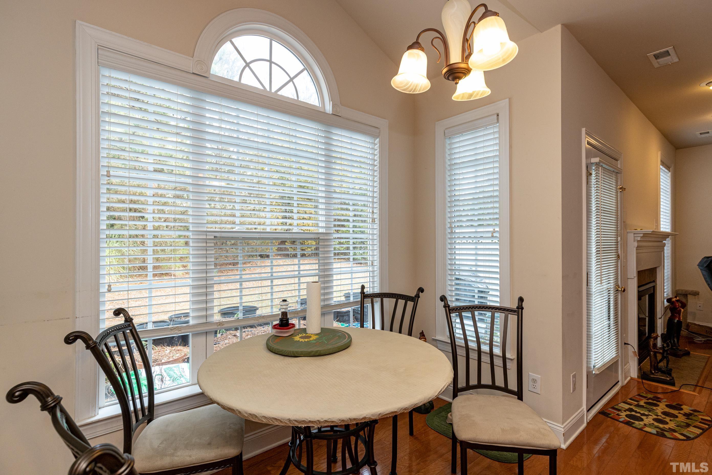 11210 Maplecroft Court Raleigh, NC 27617 - Photo 16 of 30 a view of a dining room with furniture and window