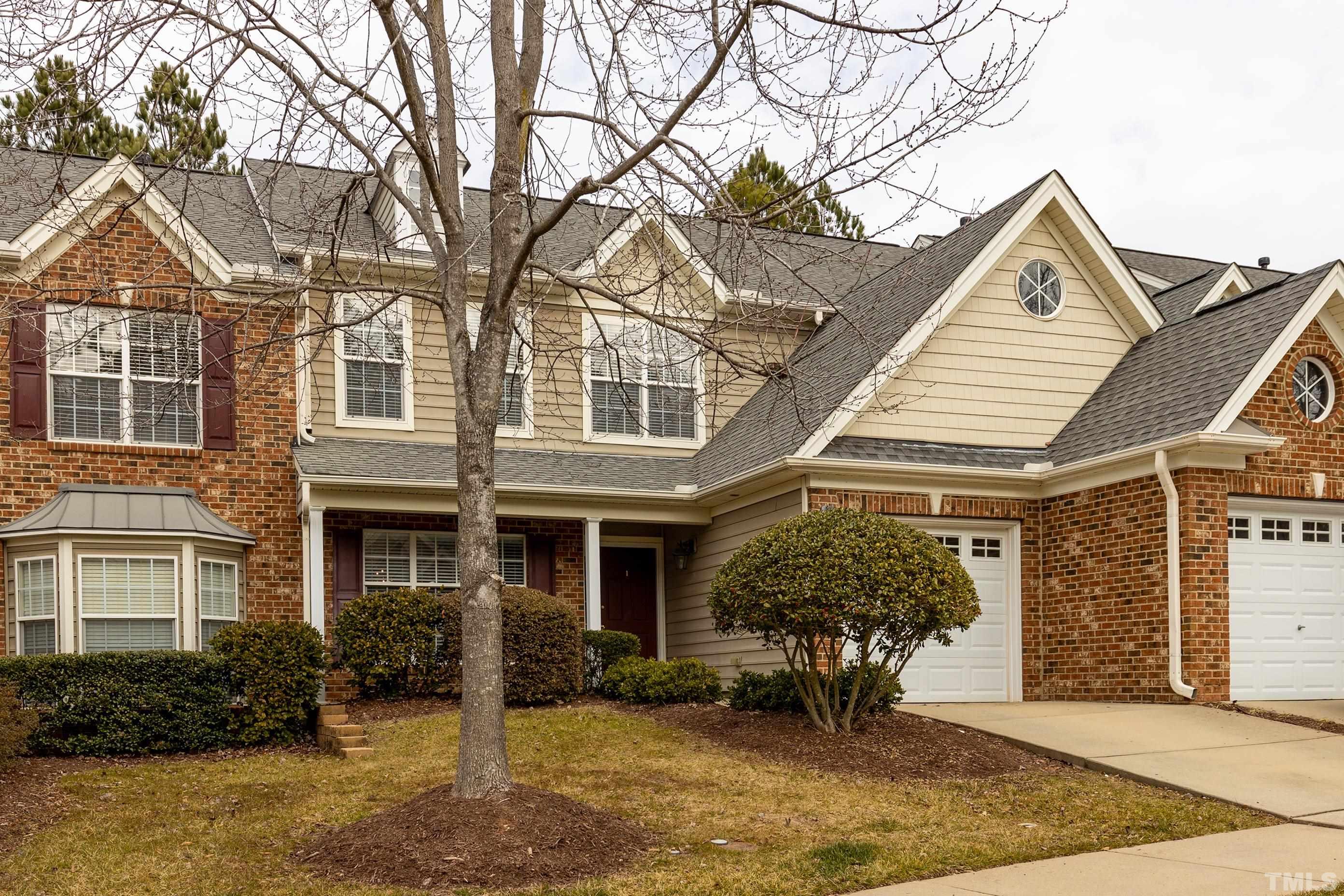 11210 Maplecroft Court Raleigh, NC 27617 - Photo 2 of 30 a front view of a house with garden