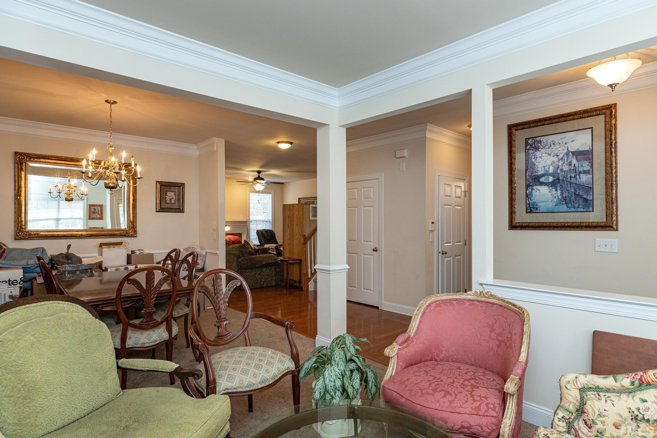 11210 Maplecroft Court Raleigh, NC 27617 - Photo 7 of 30 a view of a livingroom with furniture and windows