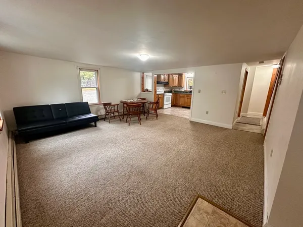 a living room with furniture and a couch