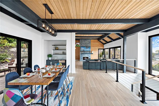 a view of a chairs and table in a balcony