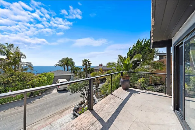 a room with furniture and a large window