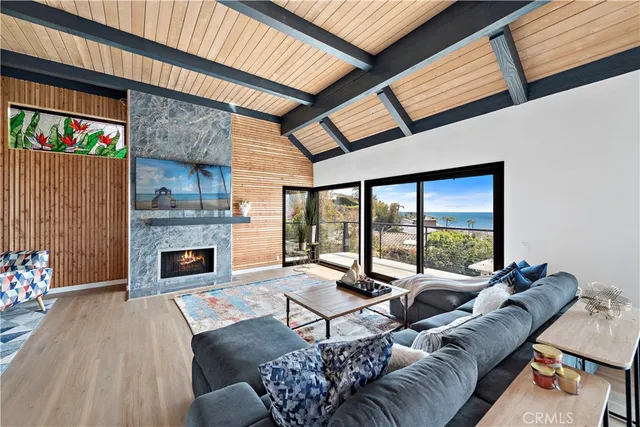 a bedroom with a large bed and a large window