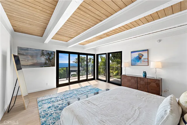 a balcony view with couple of chairs