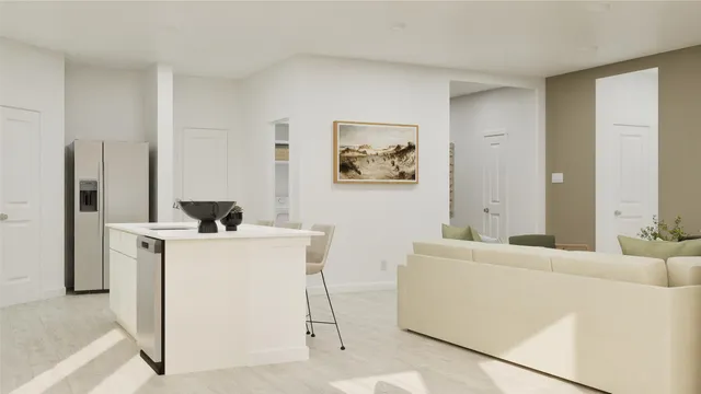 a kitchen with a table chairs cabinets and appliances