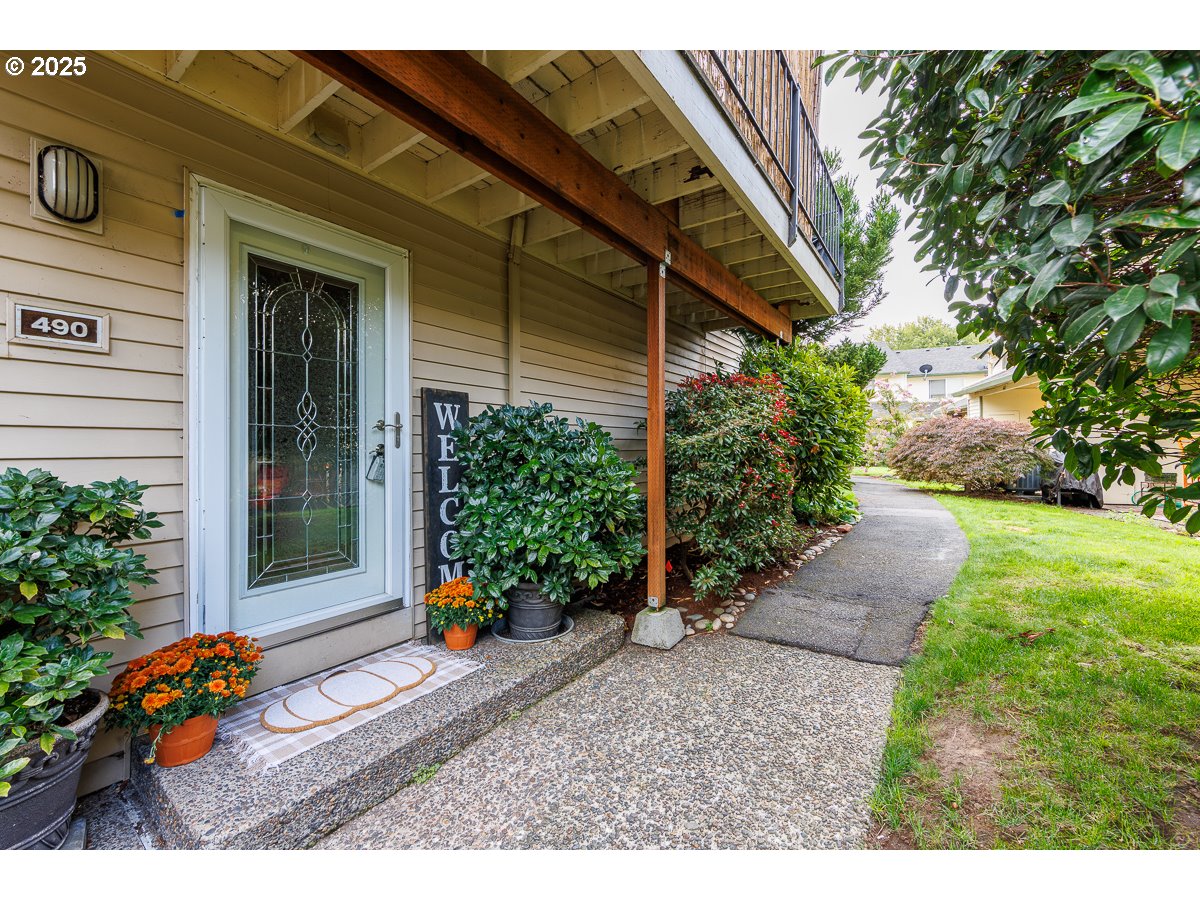 490 North Hayden Island Drive, Unit 98 Portland, OR 97217 - Photo 1 of 21 a backyard of a house with flower plants