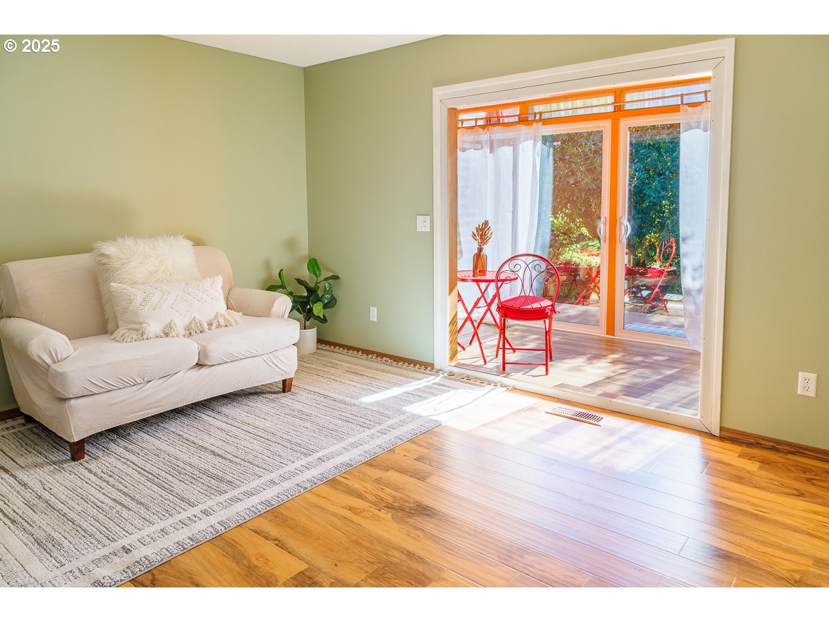 490 North Hayden Island Drive, Unit 98 Portland, OR 97217 - Photo 13 of 21 a living room with furniture and wooden floor
