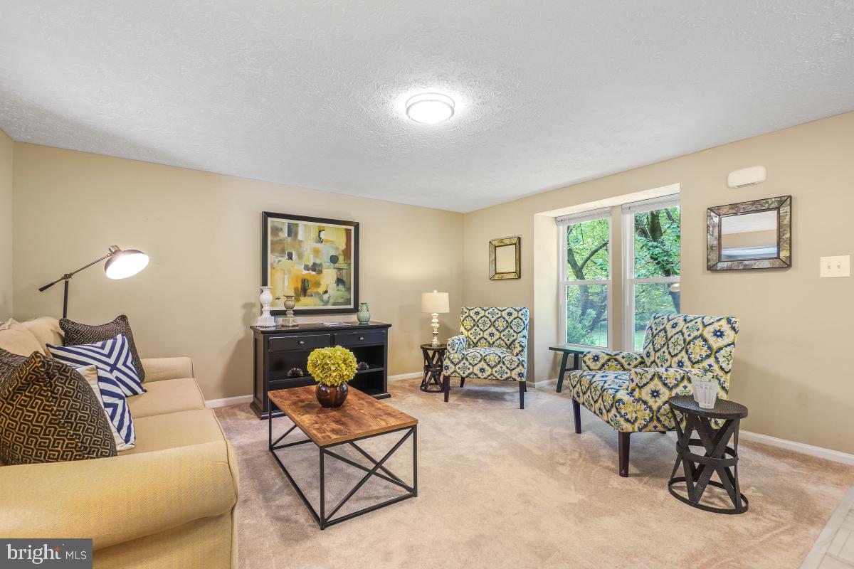 1705 Sundance Drive Reston, VA 20194 - Photo 16 of 29 a living room with furniture and a window