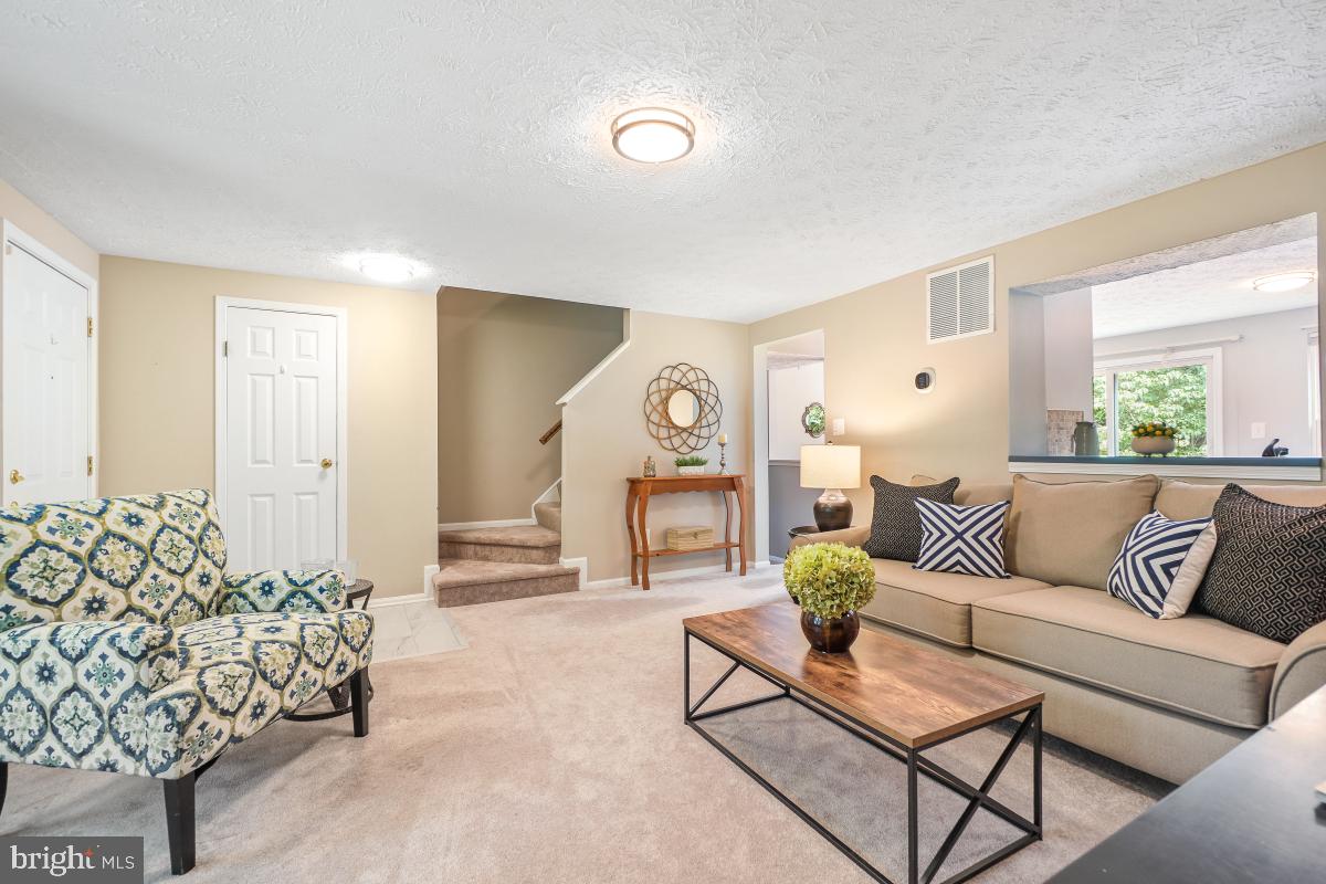 1705 Sundance Drive Reston, VA 20194 - Photo 3 of 29 a living room with furniture and a lamp