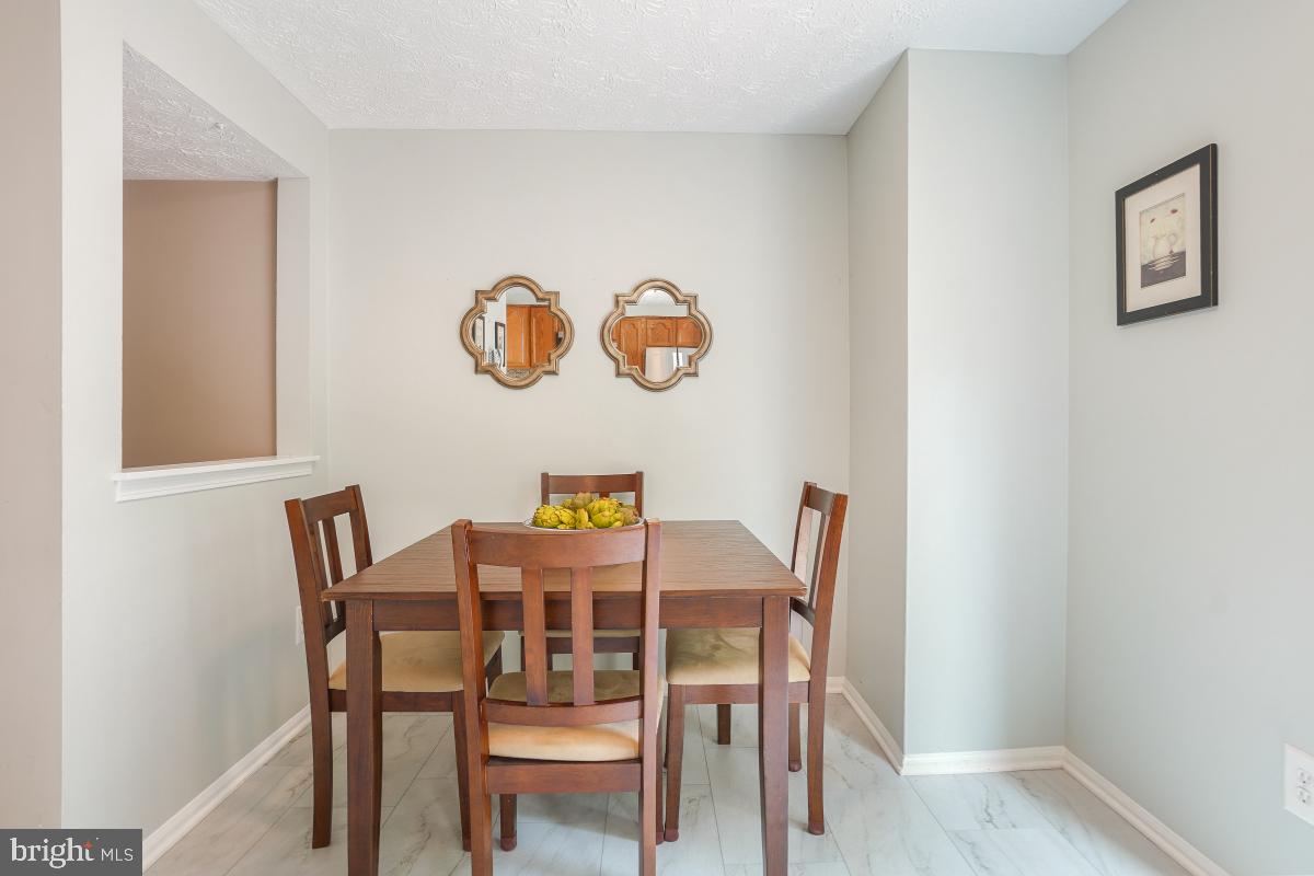 1705 Sundance Drive Reston, VA 20194 - Photo 4 of 29 a dining room with furniture and window