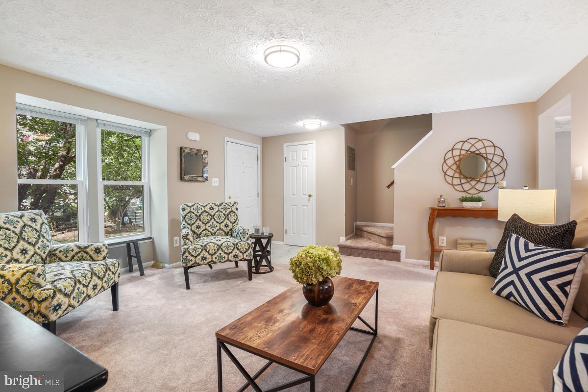 1705 Sundance Drive Reston, VA 20194 - Photo 8 of 29 a living room with furniture and wooden floor