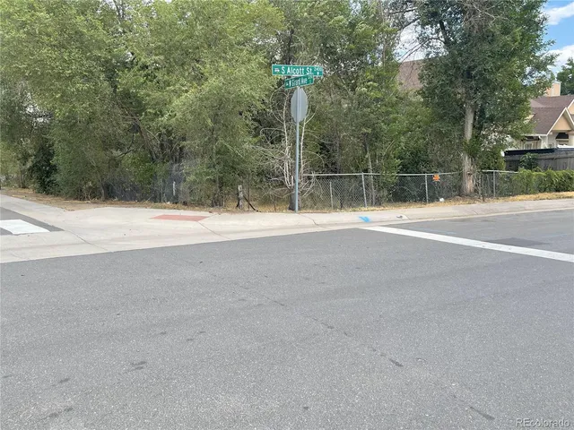 a view of swimming pool with trees in background