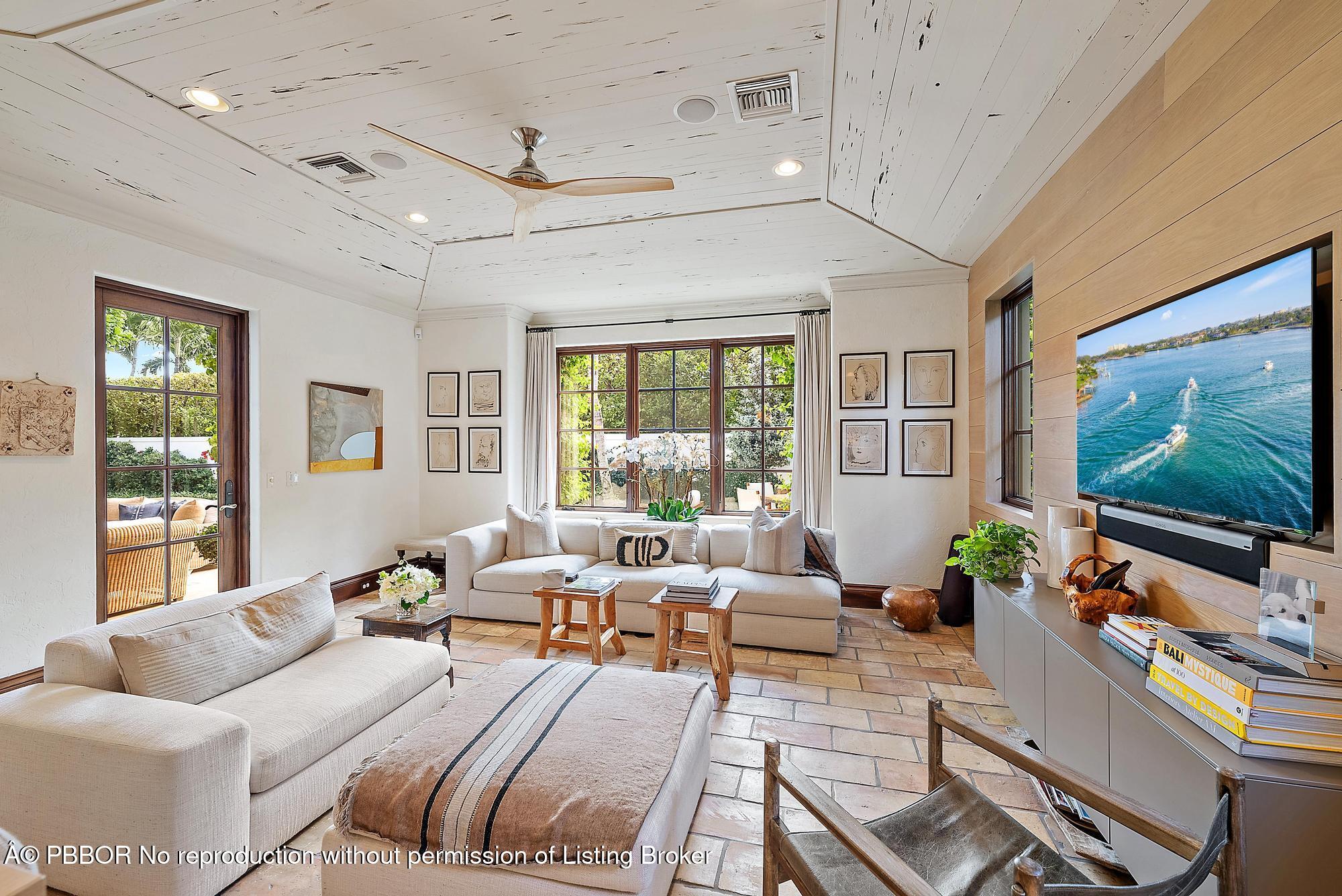 234 Ridgeview Drive Palm Beach, FL 33480 - Photo 8 of 20 a living room with furniture large window and flat screen tv