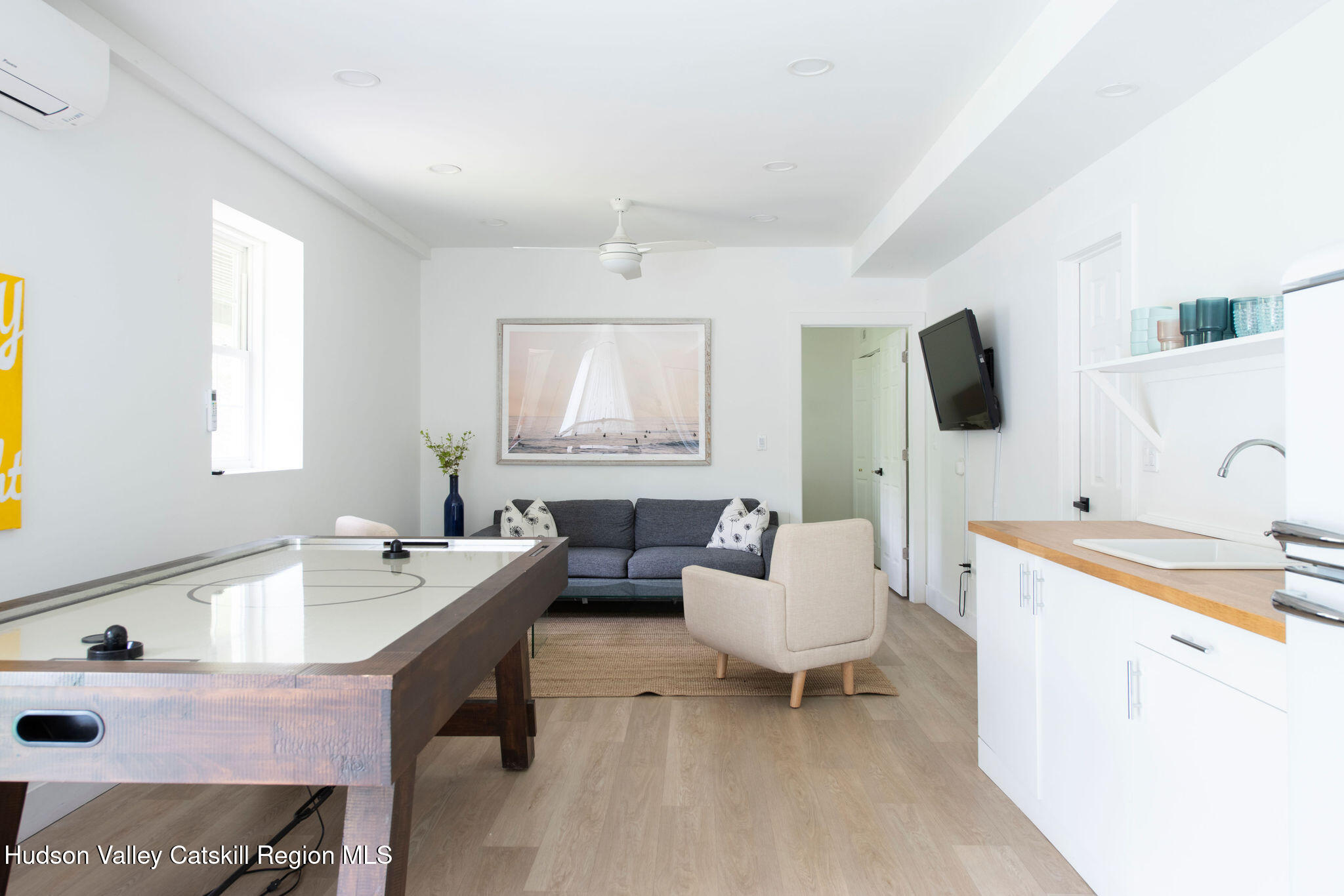 31 Laurel Hollow Road Kerhonkson, NY 12446 - Photo 28 of 47 a living room with furniture and a flat screen tv
