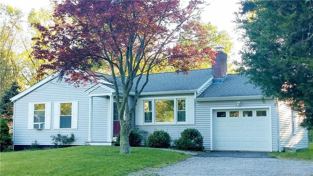 8 Key Rock Road Newtown, CT 06470 - Photo 1 of 1 a front view of a house with a garden and yard