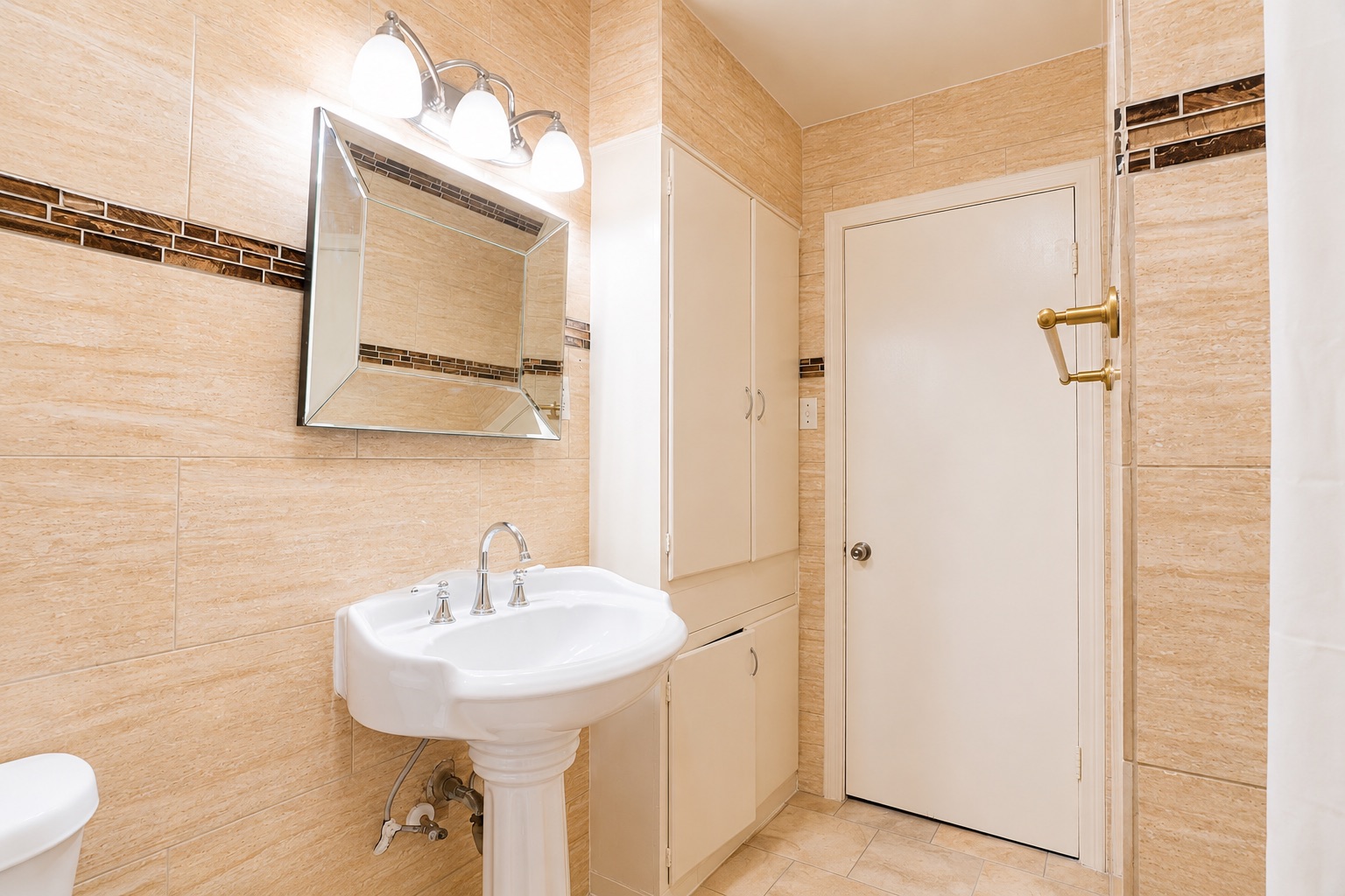 1508 Walnut Street Georgetown, TX 78626 - Photo 10 of 37 Tiled bathroom with pedestal sink, featuring built-in storage and a decorative mirror.