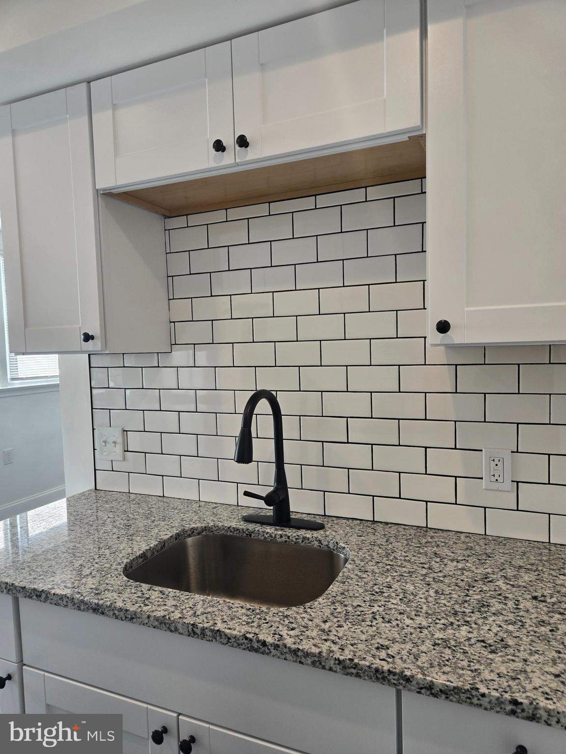 1304 Fanshawe Street Philadelphia, PA 19111 - Photo 12 of 49 a close view of a sink and tap