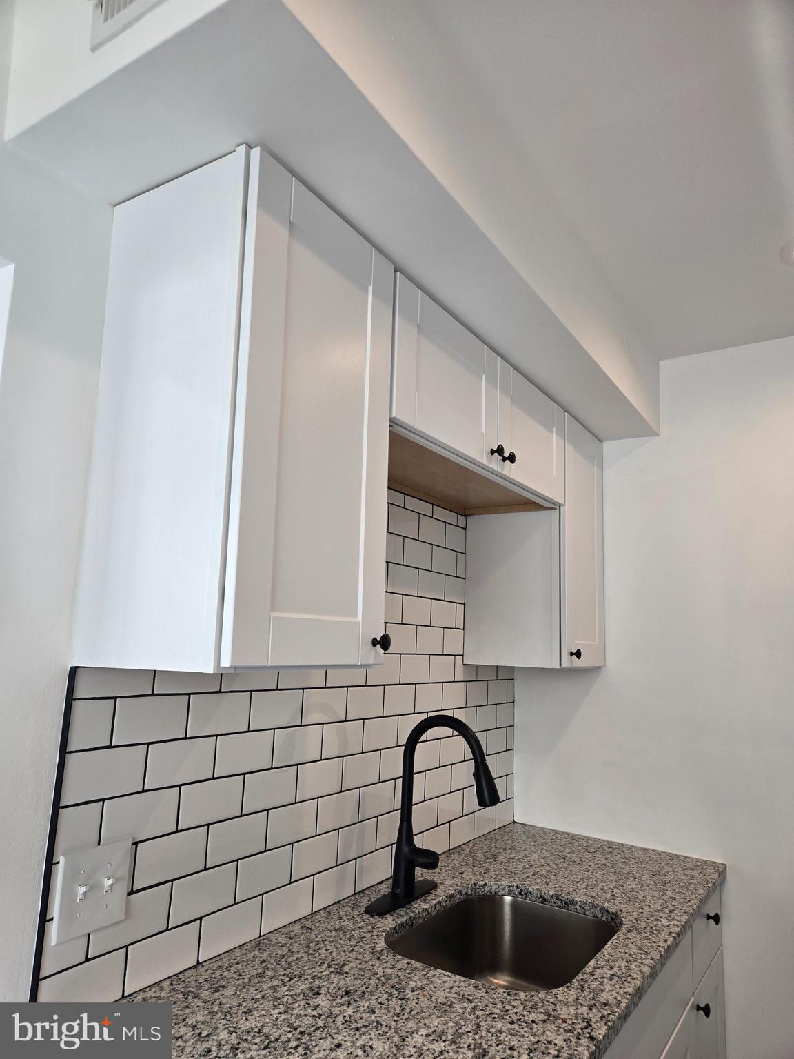 1304 Fanshawe Street Philadelphia, PA 19111 - Photo 13 of 49 a close view of a sink a mirror and vanity