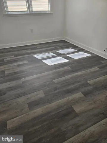 a view of a room with an empty space