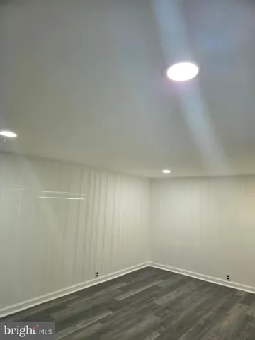 a view of an empty room with stairs