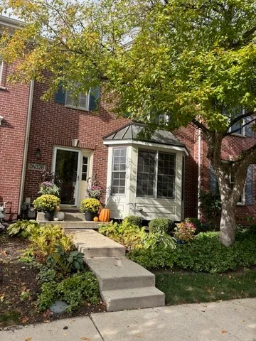 front view of a house with a patio