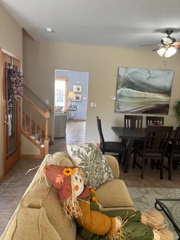 a bedroom with a bed and lamp