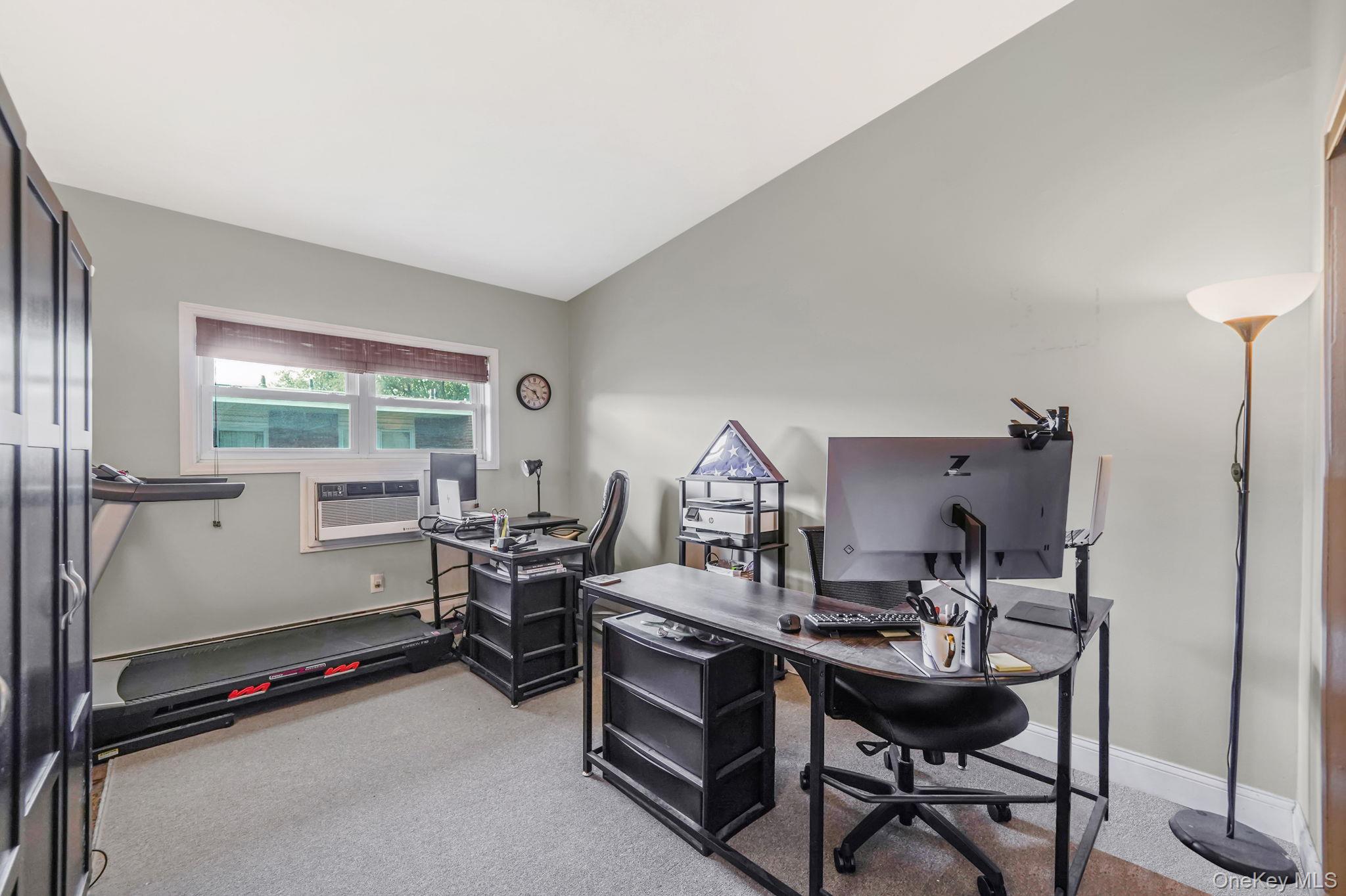 22 Ivy Street, Unit 6B Farmingdale, NY 11735 - Photo 17 of 26 a room with furniture