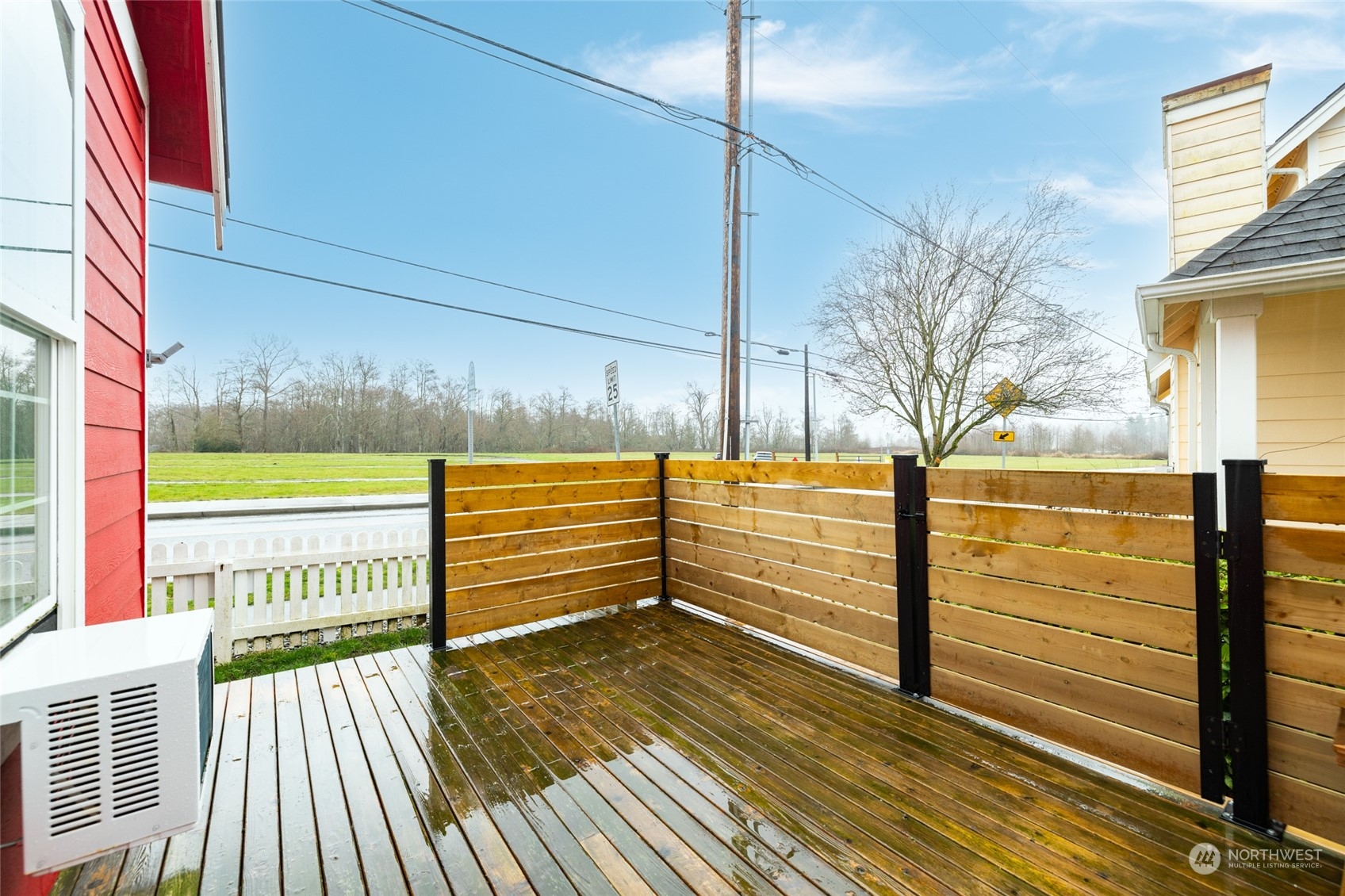 1505 Wildflower Way Sedro-Woolley, WA 98284 - Photo 20 of 24 a view of a balcony with wooden floor