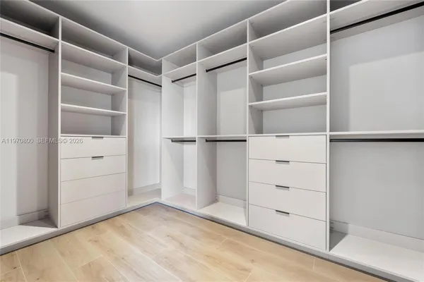 a view of an empty walk in closet