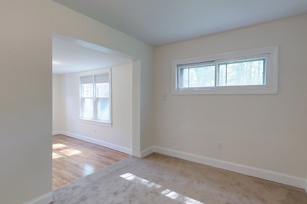 92 Squannacook Road Shirley, MA 01464 - Photo 16 of 38 an empty room with windows