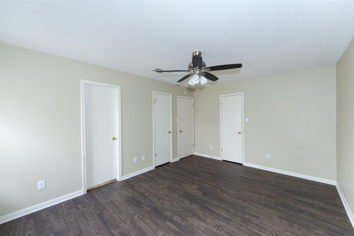 9710 Sugar Hill Drive, Unit A Austin, TX 78748 - Photo 27 of 40 a view of a big room with wooden floor and closet