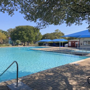9710 Sugar Hill Drive, Unit A Austin, TX 78748 - Photo 38 of 40 a front view of a house with a yard