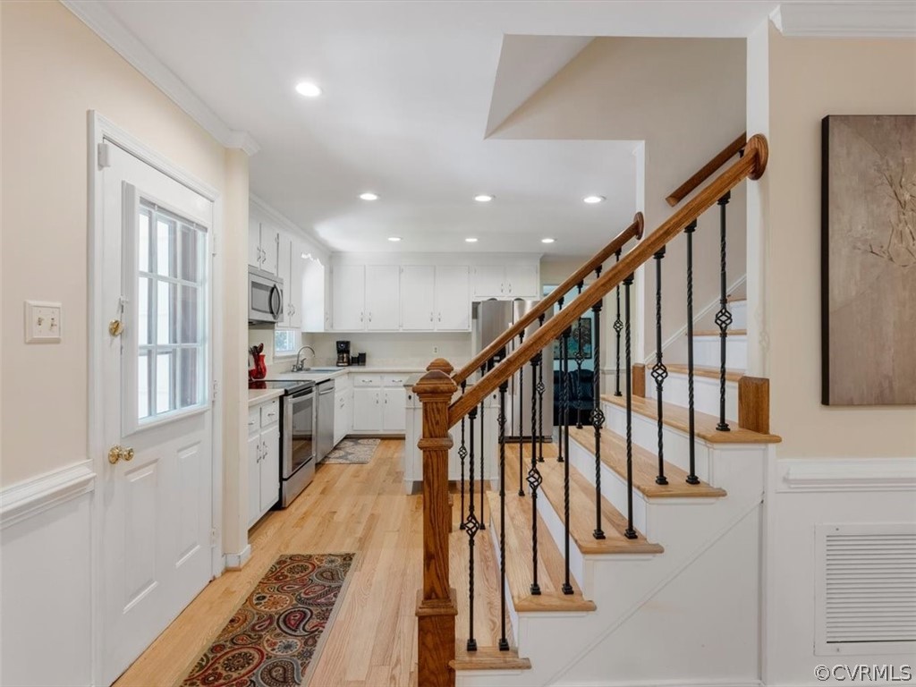 480 Eastman Road Chesterfield, VA 23236 - Photo 18 of 35 Beautiful HW staircase with iron pickets.