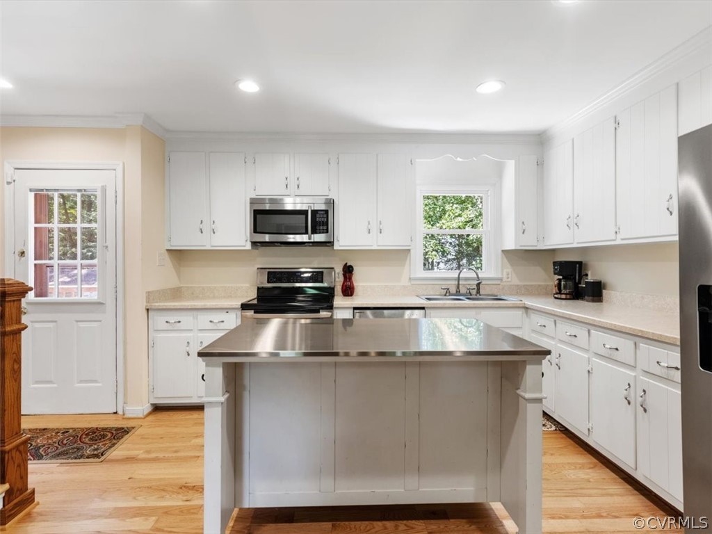 480 Eastman Road Chesterfield, VA 23236 - Photo 9 of 35 Kitchen features a large center island w/ bar stoo
